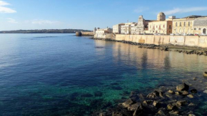 Raffinato appartamento in palazzo antico centro storico Ortigia